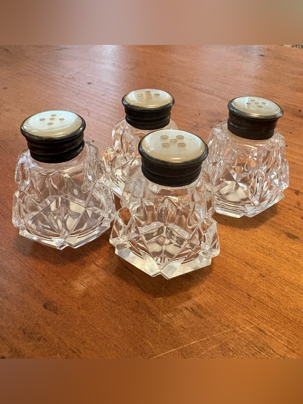 2 Sets of Cut Crystal Salt and Pepper Shakers with Silver & Mother of Pearl Lids
